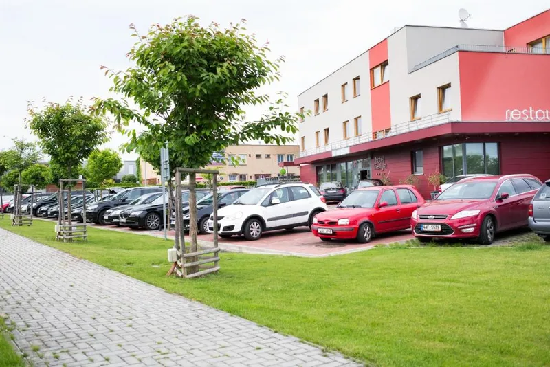 Ground-level view of the hotel parking lot at Lifestyle Hotel Prague.
