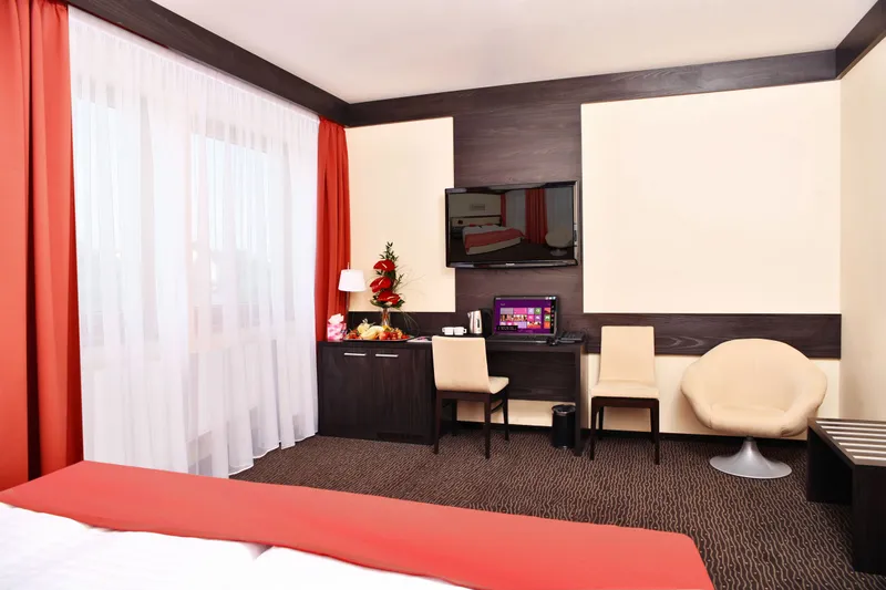 Suite desk and seating area at Lifestyle Hotel Prague.